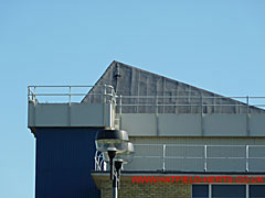 Close up of the top of the north corner of the hangar