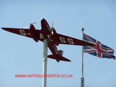 Model Comet Racer G-ACSS with Union Jack flying from the Comet Hotel behind