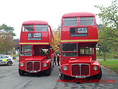 Two classic Routemaster London double decker buses used to bring demonstrators to County Hall