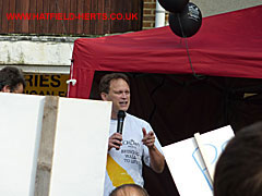 Grant Shapps MP takes the microphone