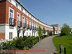 New housing on the airfield - red brickwork and cream plastering