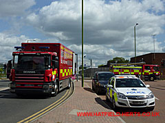 Fire support vehicle, police car and another appliance at junction with Airliner Drive and Goldsmith Road