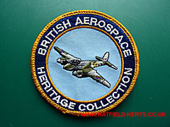 Round patch - yellow outer trim, outer circle dark blue with white lettering, inner circle light blue with DH Mosquito