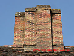 Brick chimney of the former Chequers pub