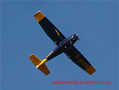 Dark blue Reims Cessna F172P with yellow tail and wingtips