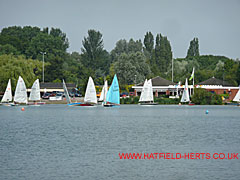 Sailing at  Stanborough Lakes - from across the lake towards the boats by the clubhouse