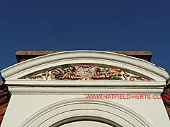 Close up of decorative emblem on arch on Hertford Brewery